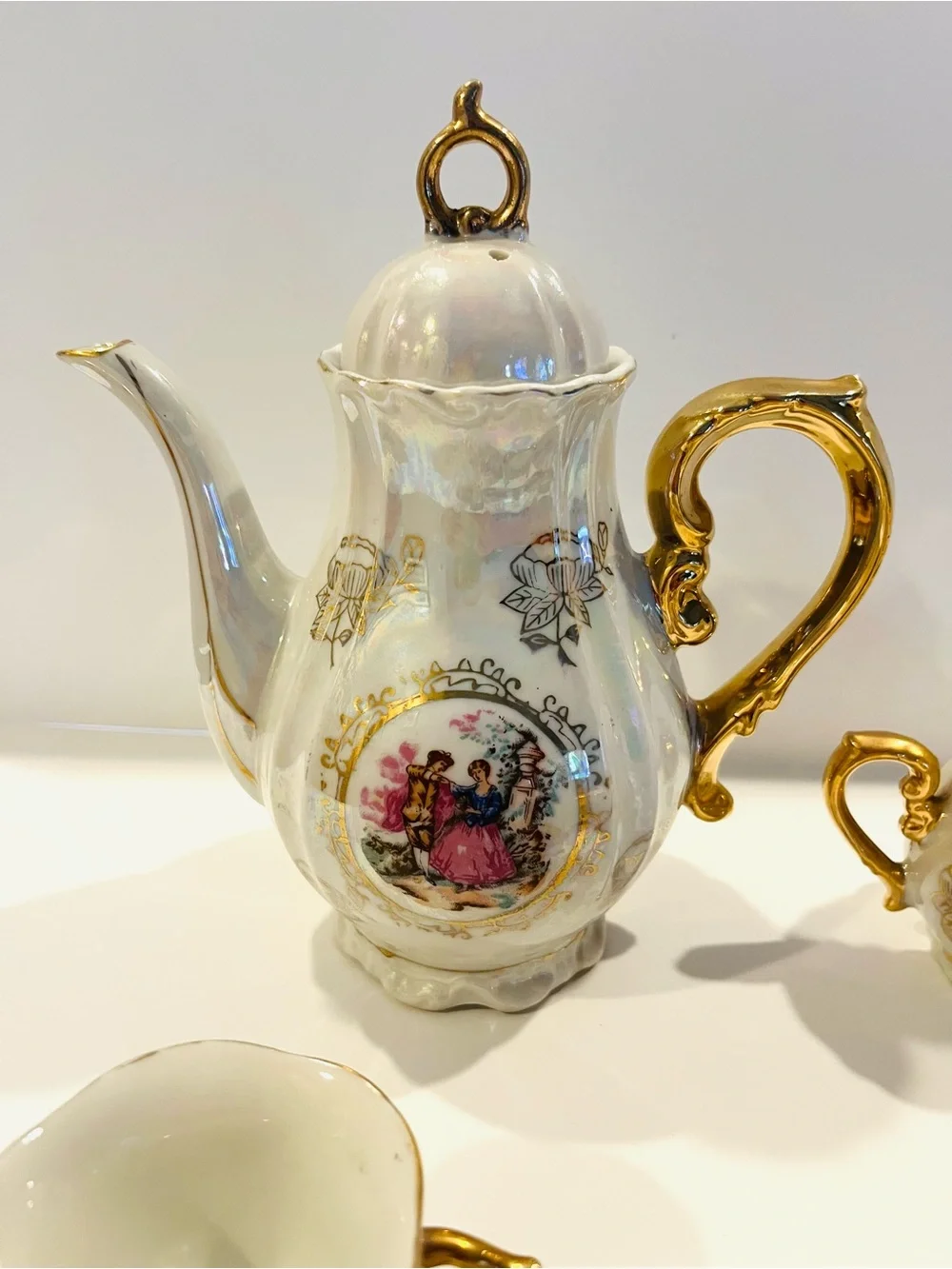 vintage porcelain tea service set from Japan features an iridescent finish